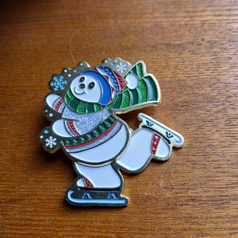 Festive Snowman Ice Skating Moving Pin